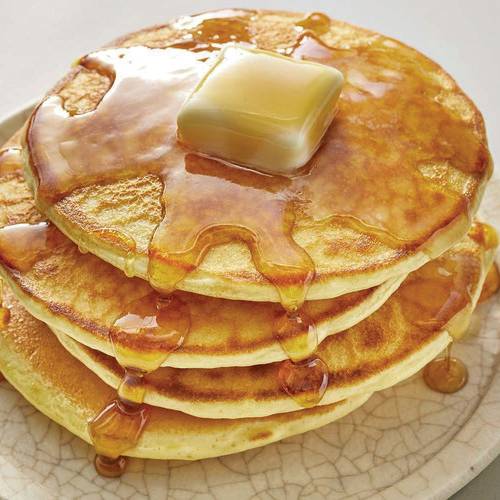 Stack of pancakes with syrup