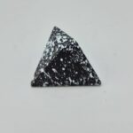 Black and white speckled pyramid shape chocolate