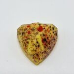 Colorful, speckled, heart-shaped chocolate
