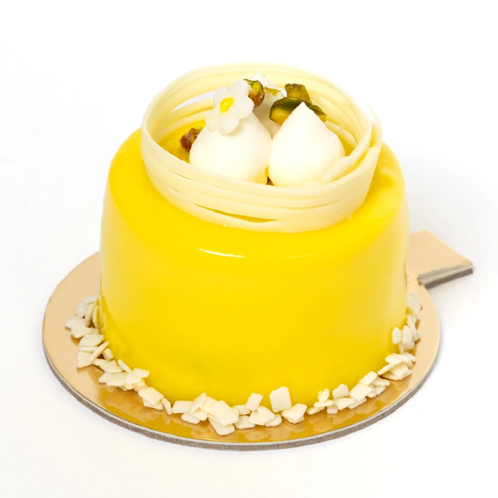 Yellow dessert with decorative toppings