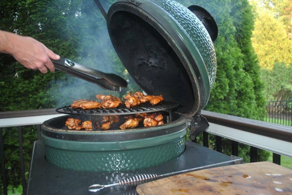 Grilling chicken wings on a smoker