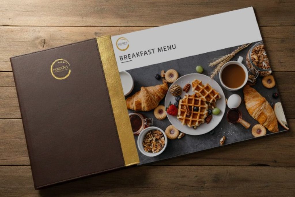 Elegant breakfast menu on wooden table