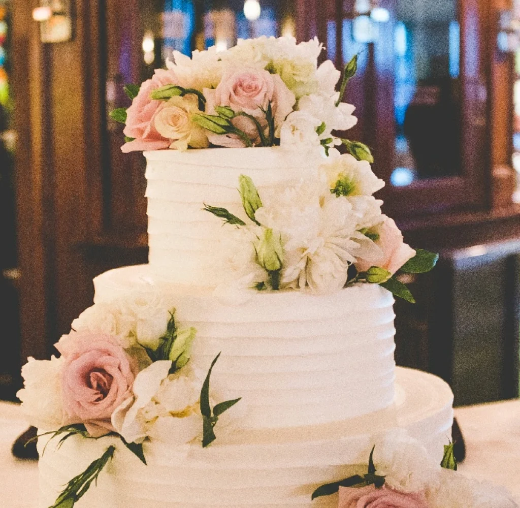 Elegant three-tiered floral wedding cake